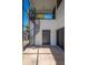 Sunroom with a spiral staircase, brick flooring, and exterior access at 949 Success Ave, Lakeland, FL 33801