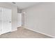 Bedroom with tile floors and entry doorway at 965 Eagle Rock Ter, Winter Haven, FL 33880