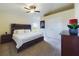 Comfortable bedroom with a large bed, vaulted ceilings, and neutral decor at 1134 Legatto Loop, Dundee, FL 33838