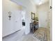 Welcoming entryway with stylish decor and a view of the bedroom at 1134 Legatto Loop, Dundee, FL 33838