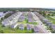 This is an aerial view of a new construction neighborhood near Polk State College at 136 Krenson Bay Loop, Winter Haven, FL 33881
