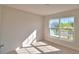 Bedroom featuring natural light, neutral walls, and carpeted floors at 136 Krenson Bay Loop, Winter Haven, FL 33881
