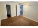 Bedroom with carpet, and two doorways at 141 Fernery Rd # B5, Lakeland, FL 33809