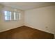 Bedroom featuring carpet, a window for natural light, and painted walls at 141 Fernery Rd # B5, Lakeland, FL 33809