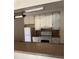 Open kitchen featuring white appliances and ample cabinetry at 141 Fernery Rd # B5, Lakeland, FL 33809