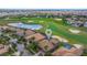 Beautiful home with tile roof, lush landscaping, screened-in pool, and golf course views at 1420 Mickelson Ct, Davenport, FL 33896