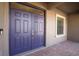 Eye-catching double front doors with a side window and brick paver landing at 1420 Mickelson Ct, Davenport, FL 33896