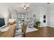 Inviting living space with a view of the patio, natural light, and stylish furniture at 1420 Mickelson Ct, Davenport, FL 33896