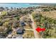 Aerial view of a home near a scenic lake, showcasing its proximity to the water at 151 3Rd Ave, Babson Park, FL 33827