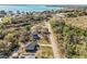 Aerial view of a home near a scenic lake, showcasing its proximity to the water at 151 3Rd Ave, Babson Park, FL 33827