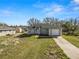 Charming single-story home with a well-maintained lawn and attached one car garage at 151 3Rd Ave, Babson Park, FL 33827