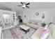 Cozy living room showcasing neutral colors, accent decor, and an open floorplan at 151 3Rd Ave, Babson Park, FL 33827