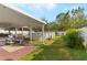 Backyard featuring a covered patio, above ground pool, gazebo and lush landscaping at 1526 Country Chase St, Lakeland, FL 33810