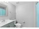 Cozy bathroom with a modern vanity and shower with a curtain at 1526 Country Chase St, Lakeland, FL 33810