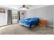 Bedroom with a ceiling fan, carpet, a window, and curtains at 1526 Country Chase St, Lakeland, FL 33810