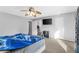 Bedroom featuring a ceiling fan, carpet, and an attached bathroom at 1526 Country Chase St, Lakeland, FL 33810
