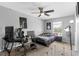 Bedroom with a ceiling fan, carpet floors, natural light, and neutral paint at 1526 Country Chase St, Lakeland, FL 33810