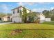 Two-story home with a two-car garage and verdant landscaping at 1526 Country Chase St, Lakeland, FL 33810