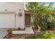 Close-up of a home's entry and landscaping at 1526 Country Chase St, Lakeland, FL 33810
