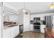 Well-lit kitchen with stainless steel appliances and tile floors at 1526 Country Chase St, Lakeland, FL 33810