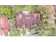 Aerial view of the large home and surrounding neighborhood at 159 Coventry Cir, Haines City, FL 33844
