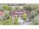 Birds-eye-view of large home with multiple garages and surrounding green space at 159 Coventry Cir, Haines City, FL 33844