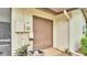 Side exterior of home with tan garage door at 159 Coventry Cir, Haines City, FL 33844