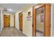 Hallway view of sauna and warning sign at 159 Coventry Cir, Haines City, FL 33844