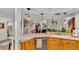Bright kitchen showcasing pendant lighting, modern sink and sight lines into living area at 159 Coventry Cir, Haines City, FL 33844