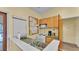 Functional kitchenette features a sink, oven, microwave, coffee maker, and ample counter space at 159 Coventry Cir, Haines City, FL 33844