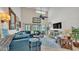 Inviting living room showcasing high ceilings, natural light and stylish furnishings at 159 Coventry Cir, Haines City, FL 33844