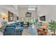 Inviting living room showcasing high ceilings, natural light and stylish furnishings at 159 Coventry Cir, Haines City, FL 33844