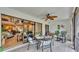 Enclosed porch showing open access to the home's interior and backyard views at 159 Coventry Cir, Haines City, FL 33844