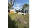 Backyard with a shed, trampoline, and basketball hoop at 1771 Bayview Dr, Lakeland, FL 33805