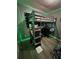 Loft bed with study area, decorated with string lights at 1771 Bayview Dr, Lakeland, FL 33805