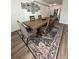 A lovely dining room showcasing a large table and an area rug at 1771 Bayview Dr, Lakeland, FL 33805