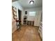 Eat In Kitchen with white cabinets and ample storage space at 1771 Bayview Dr, Lakeland, FL 33805