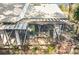 Overhead shot of sunroom addition to the house, showing roof and patio area at 21 Townhill Dr, Eustis, FL 32726
