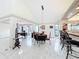 Open floor plan shows dining area, kitchen bar and office area with bright tile floors at 21 Townhill Dr, Eustis, FL 32726