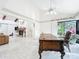 Bright living space, showing the office, fireplace, and airy layout, creating an inviting atmosphere at 21 Townhill Dr, Eustis, FL 32726
