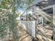 The outdoor area leads into a sunroom with plenty of room for potted plants at 21 Townhill Dr, Eustis, FL 32726
