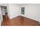Bright bedroom with wood-look floors and natural light at 2443 Torrens Dr, Lakeland, FL 33805