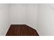 Walk-in closet featuring wood-look floors and ample shelving at 2443 Torrens Dr, Lakeland, FL 33805