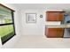 Bright kitchen nook with granite counters, stainless appliances and view of the yard at 2443 Torrens Dr, Lakeland, FL 33805
