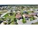 Aerial view of neighborhood featuring well-maintained homes with mature landscaping and trees at 246 Laynewade Rd, Polk City, FL 33868