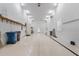 Large garage with overhead lighting at 246 Laynewade Rd, Polk City, FL 33868
