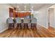 Eat-in kitchen features an island with granite countertops and seating for four at 246 Laynewade Rd, Polk City, FL 33868