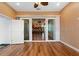 Inviting living room features wood floors and sliding doors to an outdoor space at 246 Laynewade Rd, Polk City, FL 33868