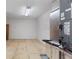 View of an unfinished room with plywood flooring and HVAC equipment installed at 246 Laynewade Rd, Polk City, FL 33868