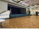 Large auditorium featuring a stage, elegant decor, and a spacious, well-lit area at 2820 Attwater Loop, Winter Haven, FL 33884